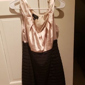 Sleeveless gold and black dress